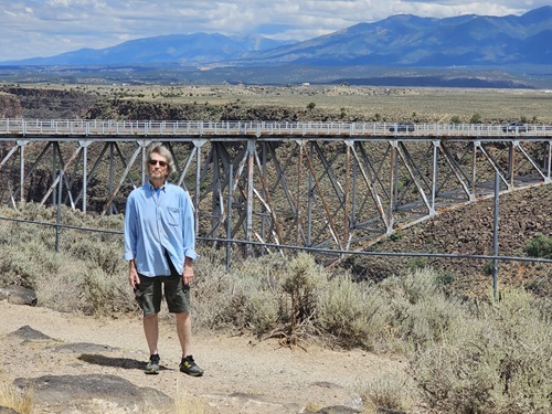 Alan Smith standing outside next to Rio Grande Gorge, outside of Taos, New Mexico 
