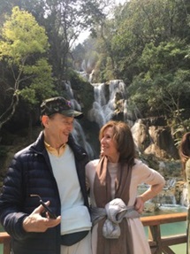 Kathy Michael with waterfall in background