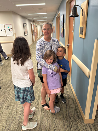 Vassar Brothers Medical Center breast cancer patient Linda Deserto with three of her young grandkids.