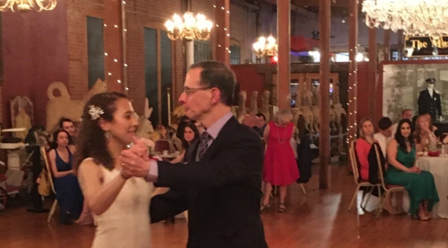 William dancing with his daughter Erica at her wedding reception