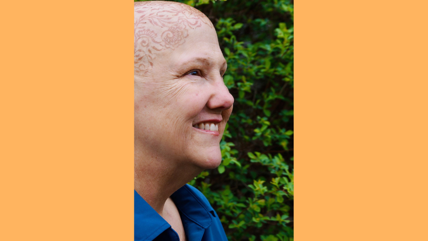 Vassar Brothers Medical Center breast cancer patient Linda Deserto outside. She has a henna tattoo on her head after losing her hair from chemotherapy to treat breast cancer.