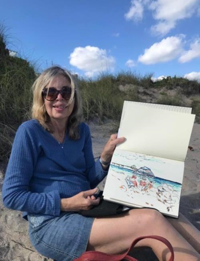 Nancy Grasso painting on the beach