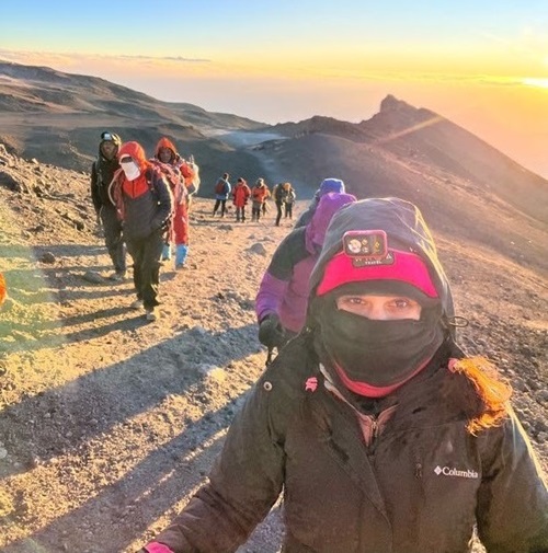 Carolina Herrera hiking Mt. Kilimanjaro in July 2023. Carolina Herrera, Norwalk Hospital spinal fusion patient, hiking Mt. Kilimanjaro in July 2023.
