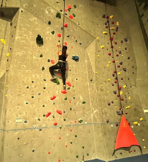 Carolina Herrera indoor rock climbing. Carolina Herrera, Norwalk Hospital spinal fusion patient, indoor rock climbing.