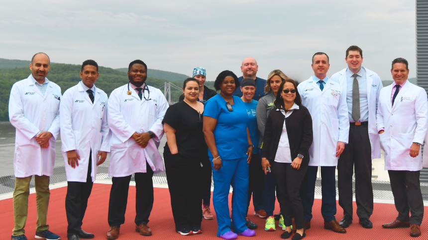 Members of the Vassar Brothers Medical Center stroke team outside on the helipad of the hospital. 