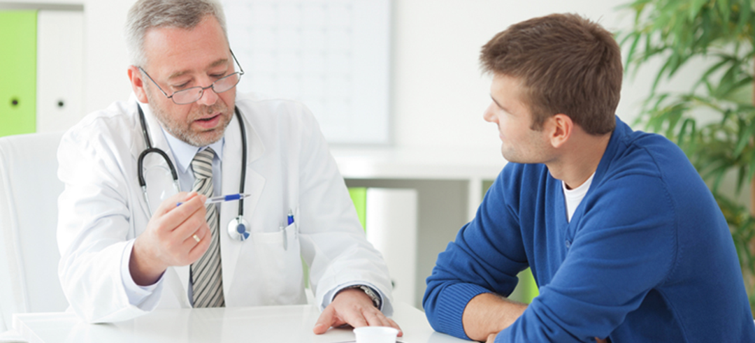 urology physician talks with male patient