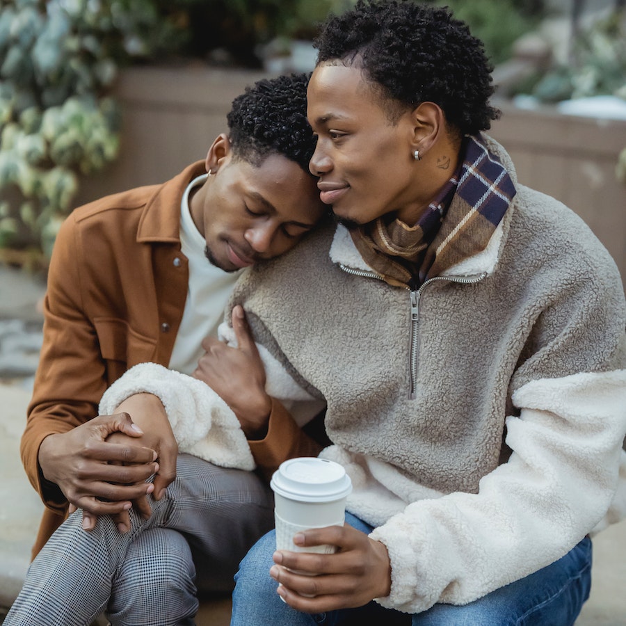 Couple sitting together with coffee