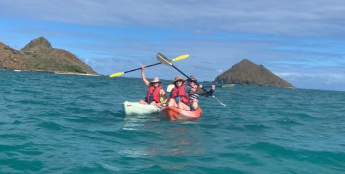 Kate Fagan (left) kayaking in Hawaii.