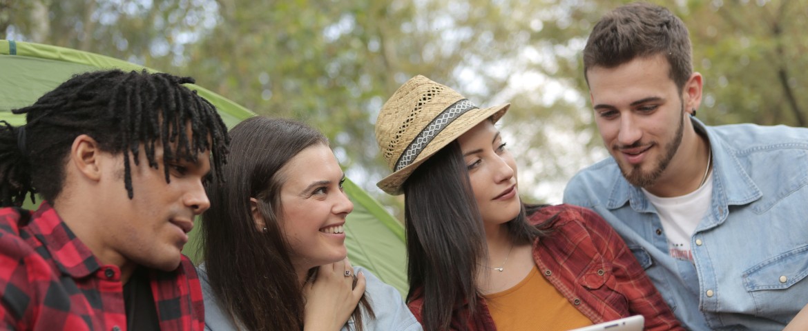 Happy, diverse group of people outdoors