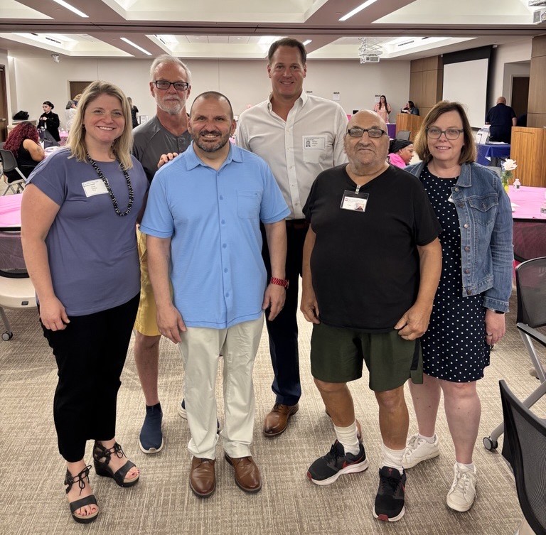 John Manganiello (center, left) with his dad (center, right) and friends at the Vassar Brothers Medical Center Cancer Survivors Event in June 2025.