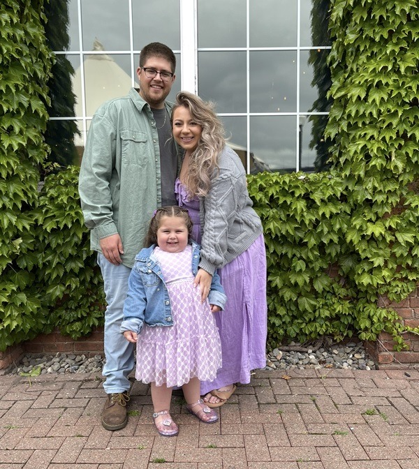 Zach with his fiancé, Gina, and daughter, Lilliana.