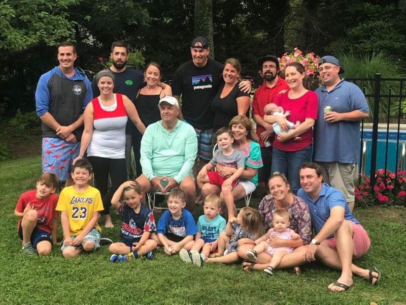 Gerard Keough, a Norwalk Hospital spine surgery patient, with his family, including his wife, seven children and 10 grandchildren.