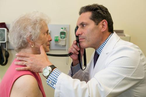Hero Dr Paul Wright with Patient