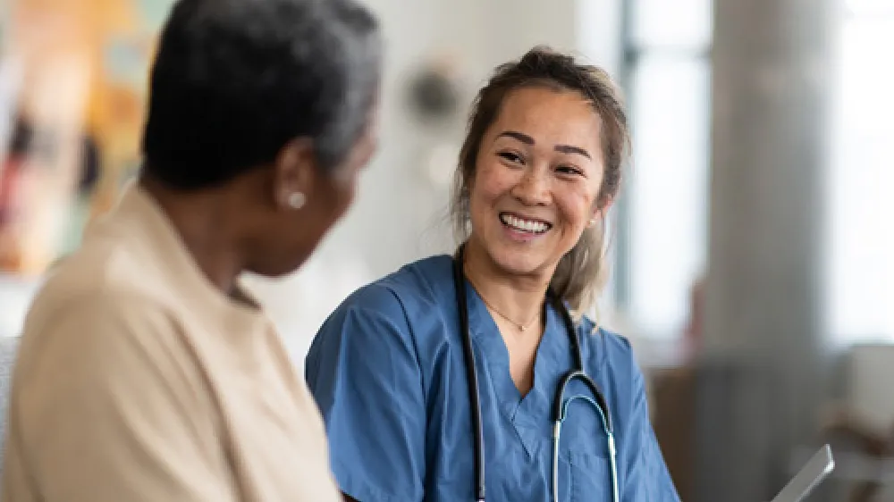 Primary Care provider with patient at appointment