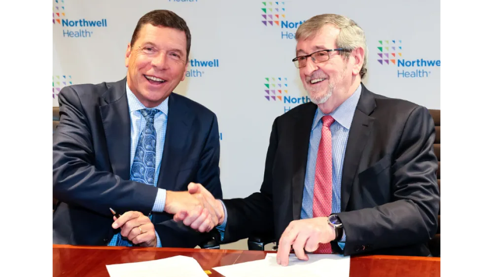 ohn M. Murphy, MD and Michael Dowling, CEO signing the official agreement merging Northwell Health and Nuvance Health.