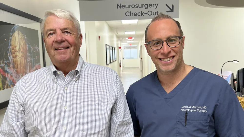 Gerard Keough, a Norwalk Hospital spine surgery patient, with neurosurgeon Dr. Joshua Marcus