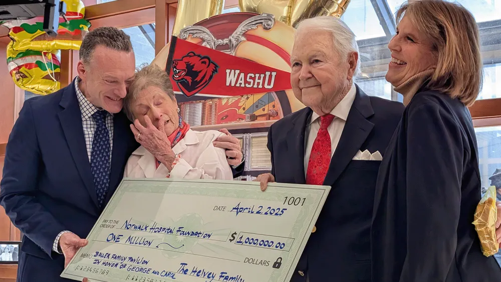 Carol and George Bauer are presented with a $1M check donated by the Helvey Family for a new patient pavilion at Norwalk Hospital. 