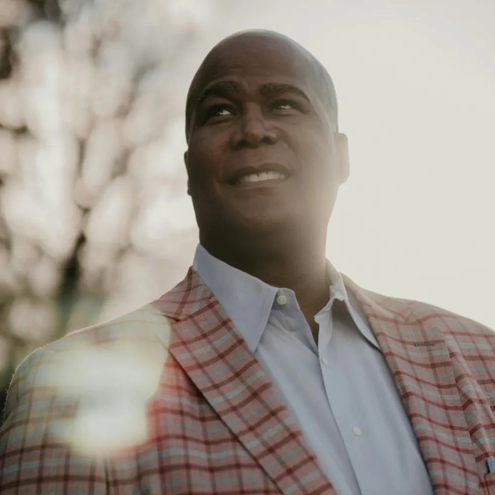Man in red and white plaid shirt